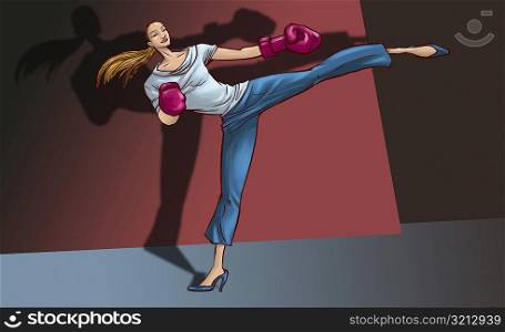 Young woman practicing kickboxing