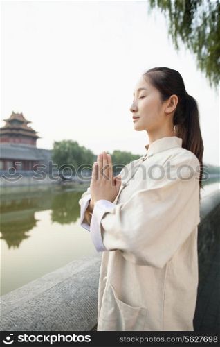 Young Woman Practicing Tai Ji