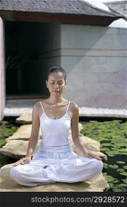 Young woman practising yoga