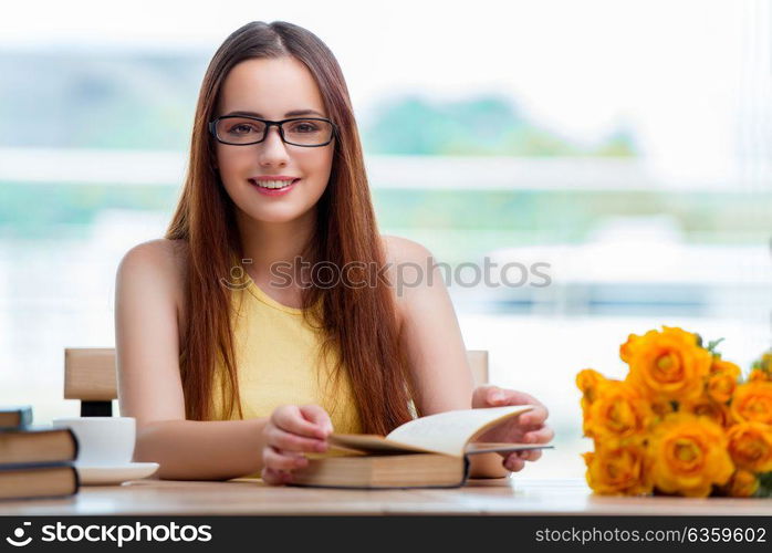 Young woman preparing for school exams