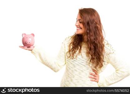 Young woman presenting a piggy bank (money box) - savings concept