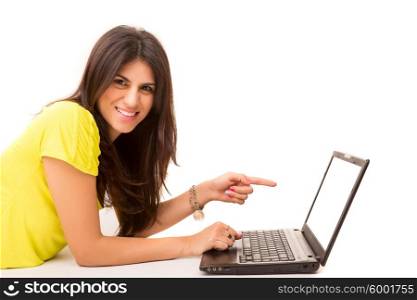 Young woman presenting your product on a laptop