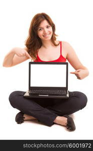 Young woman presenting your product on a laptop