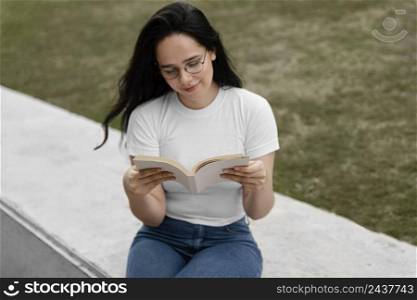 young woman reading interesting book 3