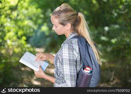 young woman reading the map