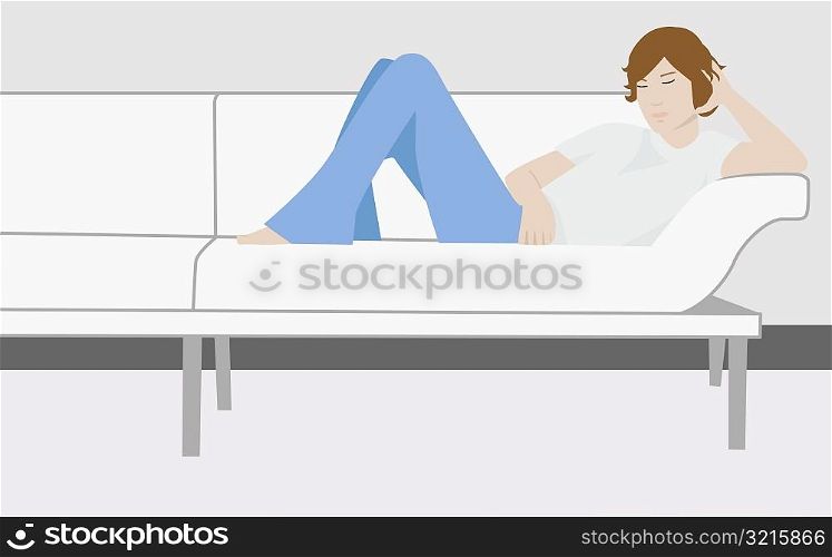 Young woman reclining on a couch