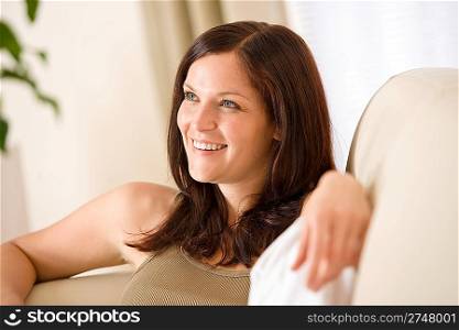 Young woman relax in lounge on sofa