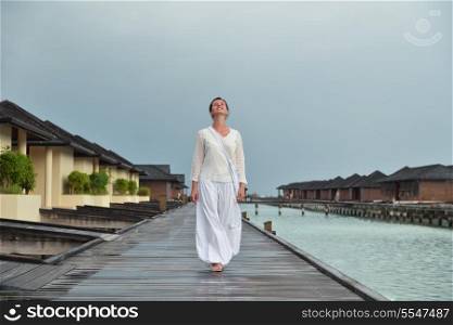 young woman relax on cloudy summer day and bad weather