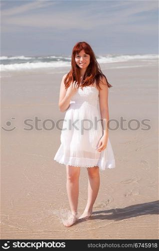 Young woman relaxing at the beach