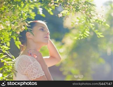Young woman relaxing in forest