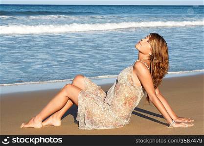 Young Woman Relaxing on Beach