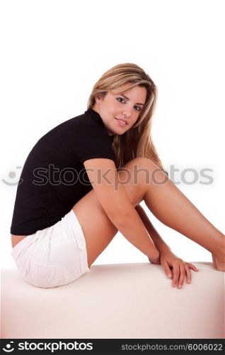 Young woman relaxing on couch - isolated