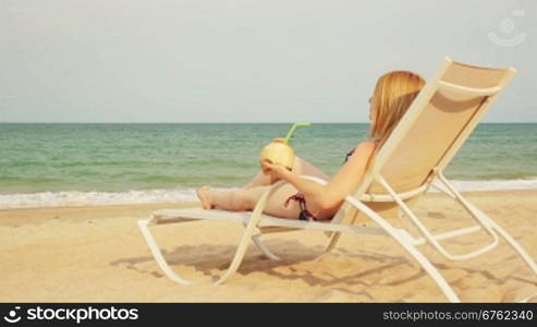 young woman relaxing on the beach