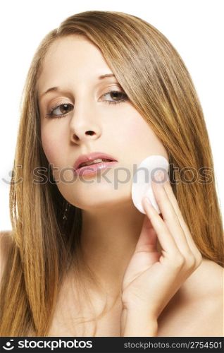 young woman removing makeup. young woman removing makeup on white background