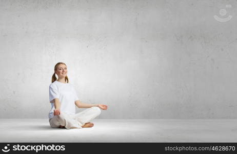 Young woman representing soul balance and meditation concept. Recreation and relax