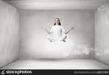 Young woman representing soul balance and meditation concept. Recreation and relax