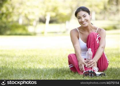 Young Woman Resting After Exercise