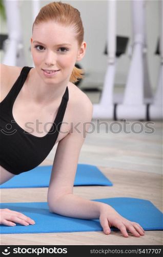 young woman resting after fitness
