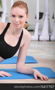 young woman resting after fitness