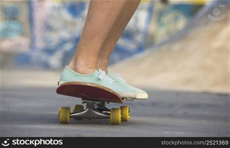 Young woman riding a skateboard