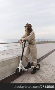 young woman riding electric scooter 12