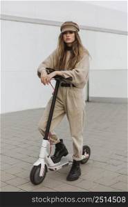 young woman riding electric scooter 15