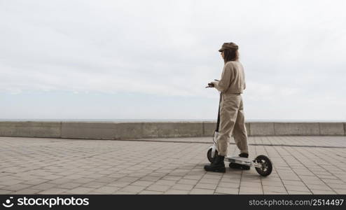 young woman riding electric scooter 4