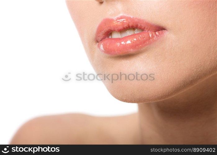 Young woman&rsquo;s Lips close up isolated on white