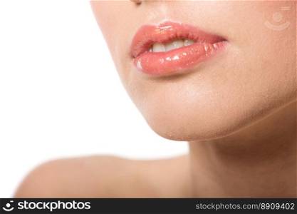Young woman&rsquo;s Lips close up isolated on white