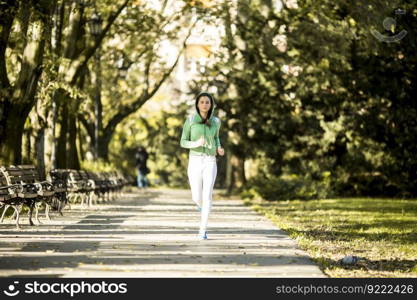 Young woman running in the park