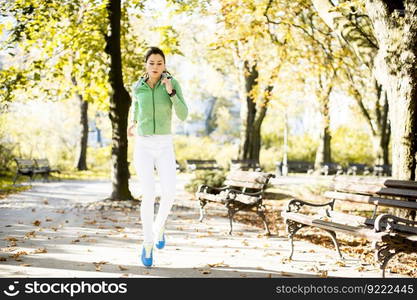 Young woman running in the park