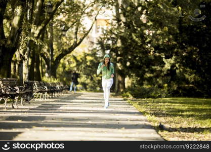 Young woman running in the park