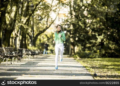 Young woman running in the park