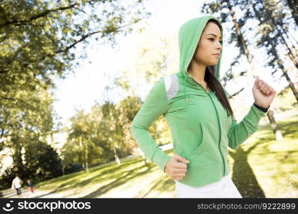 Young woman running in the park