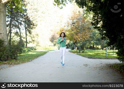 Young woman running in the park