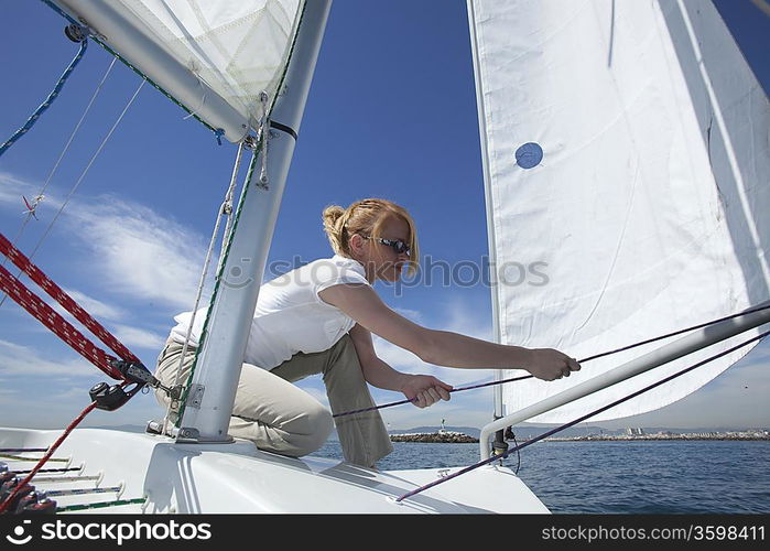 Young woman sailing