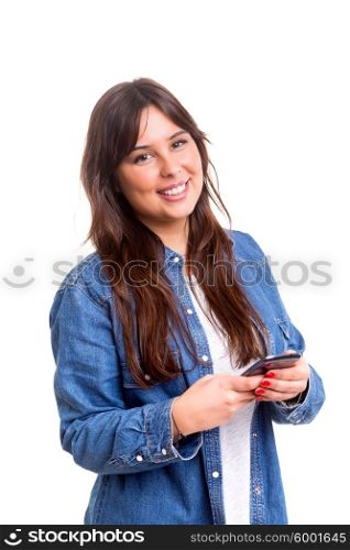 Young woman sending a sms on her smartphone