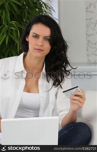 young woman shopping on-line