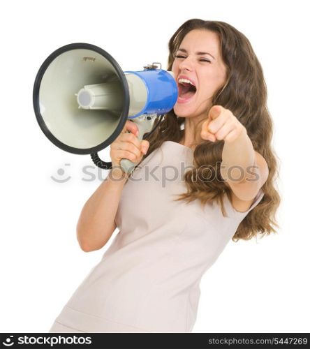 Young woman shouting in megaphone and pointing in camera