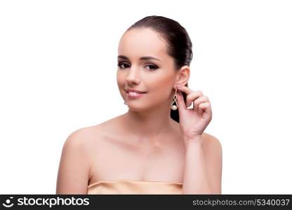 Young woman showing off jewellery isolated on white