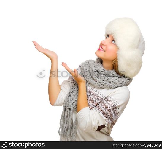 Young woman shows pointing gesture isolated