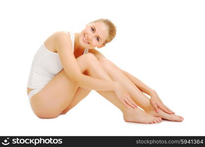 Young woman sit on the floor isolated