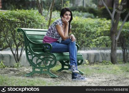 Young woman sitting on a bench