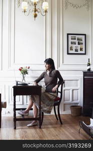 Young woman sitting on a chair