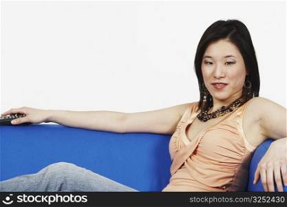 Young woman sitting on a couch