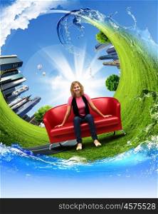 Young woman sitting on a red sofa and nature background behind her