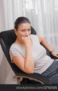 Young woman sitting on chair