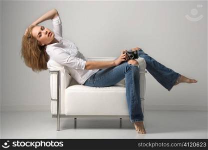 Young Woman Sitting on Chair