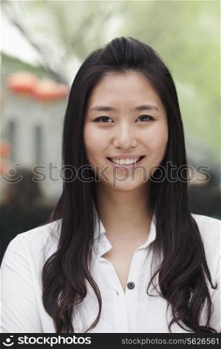 Young Woman smiling and looking at camera