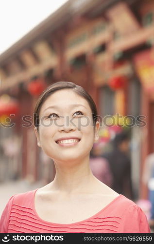 Young Woman smiling and looking away